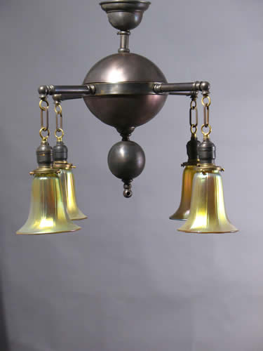 Pair of Early Industrial Arts and Crafts Chandeliers